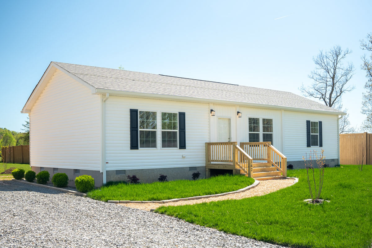 Exterior photo of a manufactured home with an attached porch