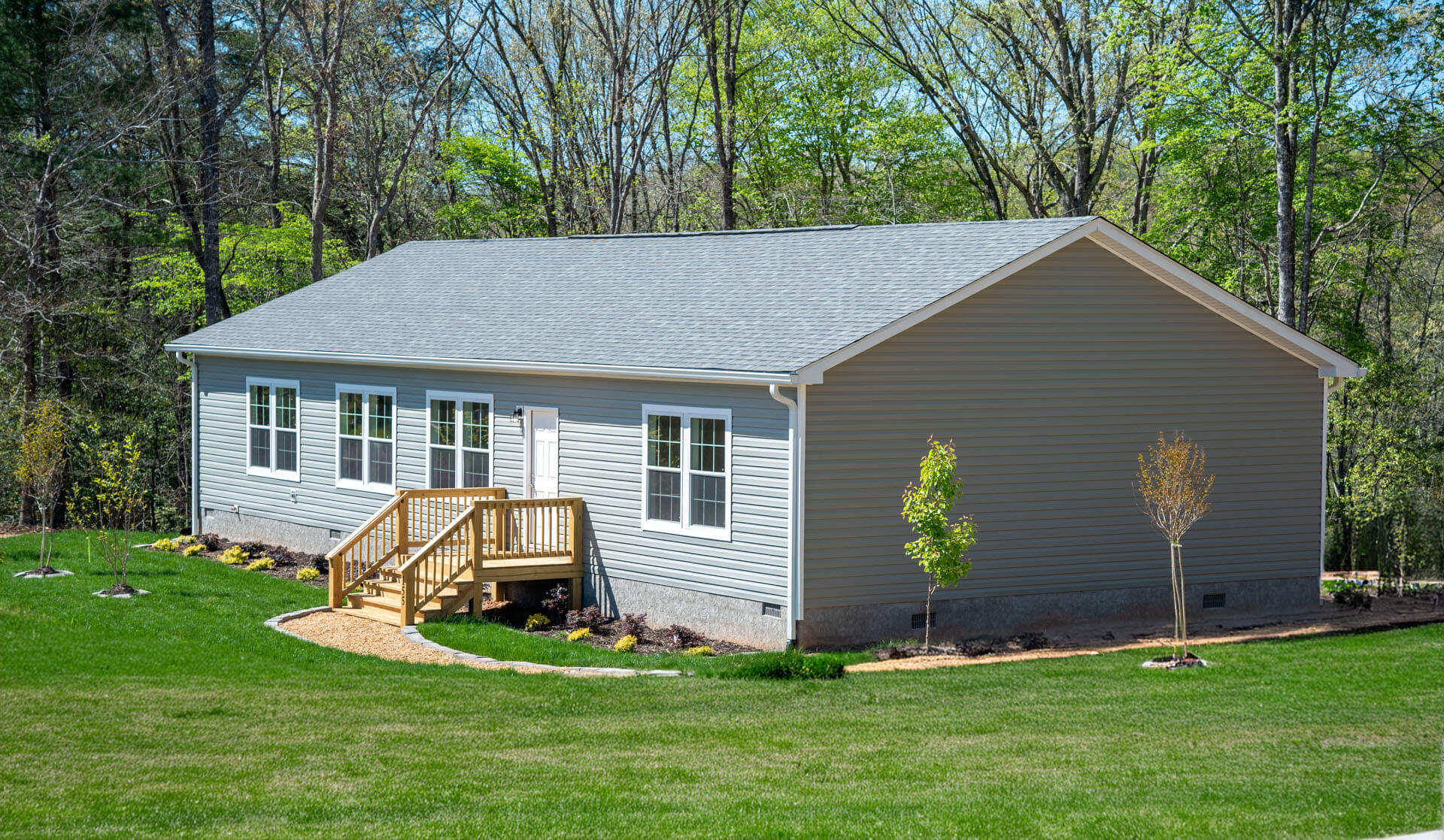 Exterior photo of a manufactured home on land